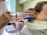 Ear syringing
